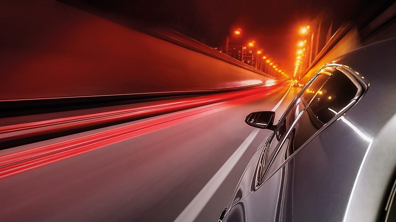 Car speeding down a road