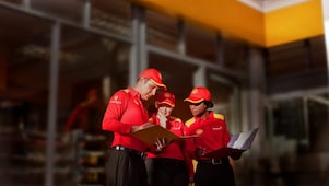 3 Shell employees discussing